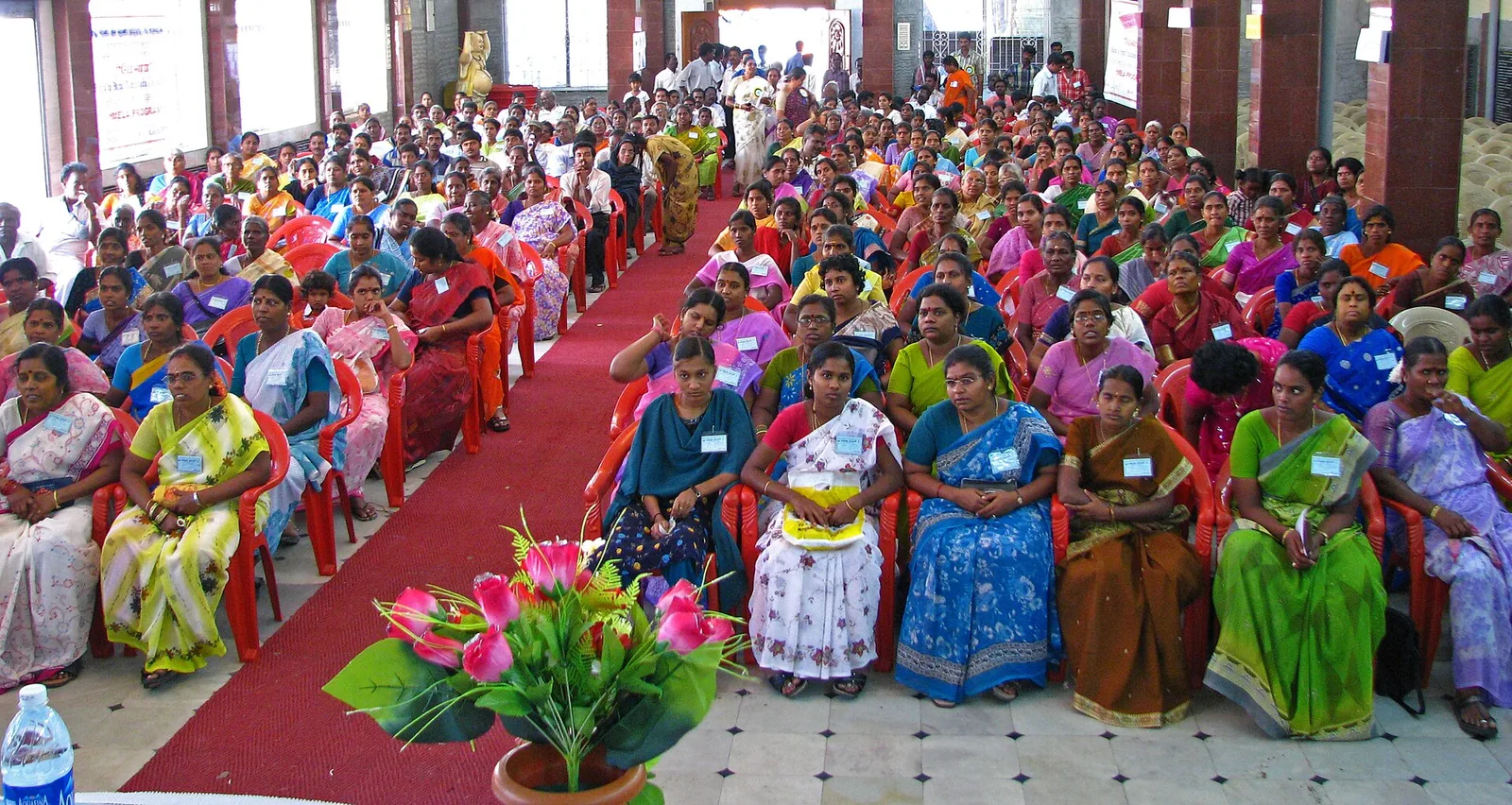 Community volunteers and program activity representing CBN Trust field work